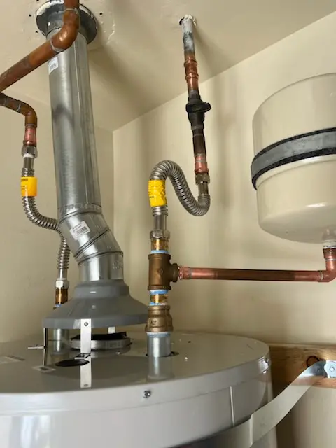 Water heater installation and plumbing repair in Pratt